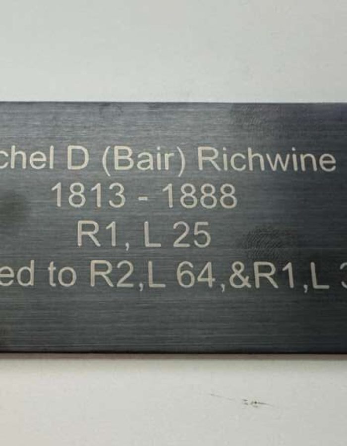 black plaque engraved